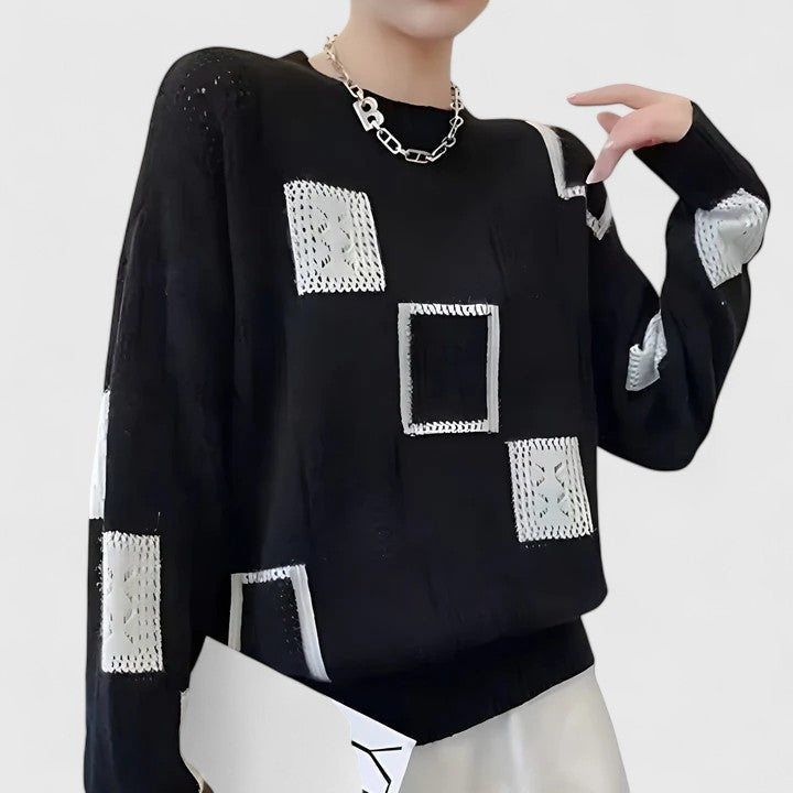Casual yet elegant women's sweater, knitted with an intricate openwork design