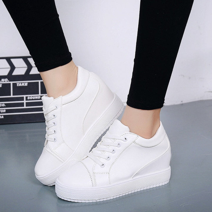 Women's lace-up wedge platform sneakers. Comfortable hidden wedge shoes for modern casual everyday fashion.