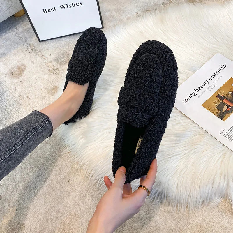 Cozy women's Lana Teddy loafers, essential for winter warmth. Plush, comfortable slip-on shoes for ultimate relaxation.
