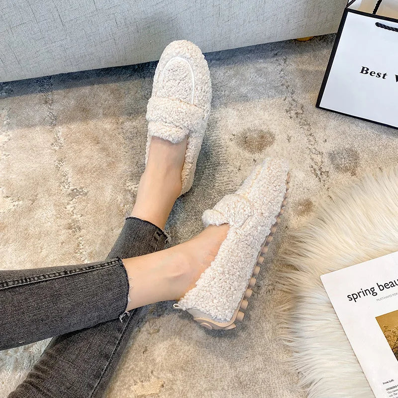 Warm women's Lana Teddy loafers, perfect cozy footwear for indoor or outdoor casual comfort. A stylish winter essential.