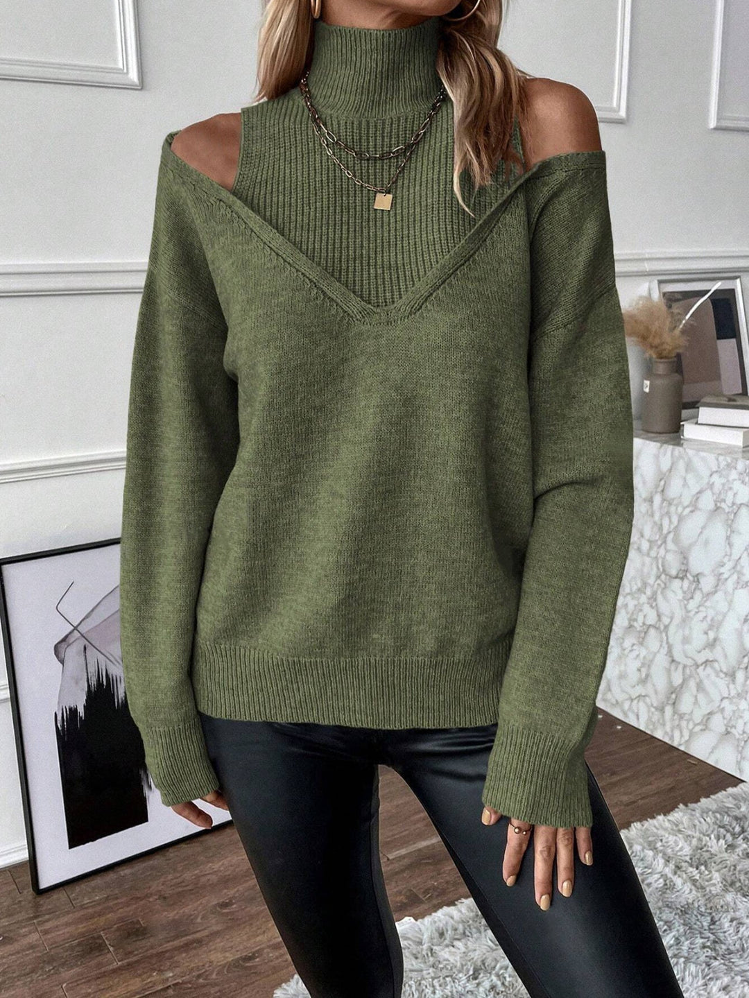 Soft knit women's cold shoulder sweater with a chic layered turtleneck design.