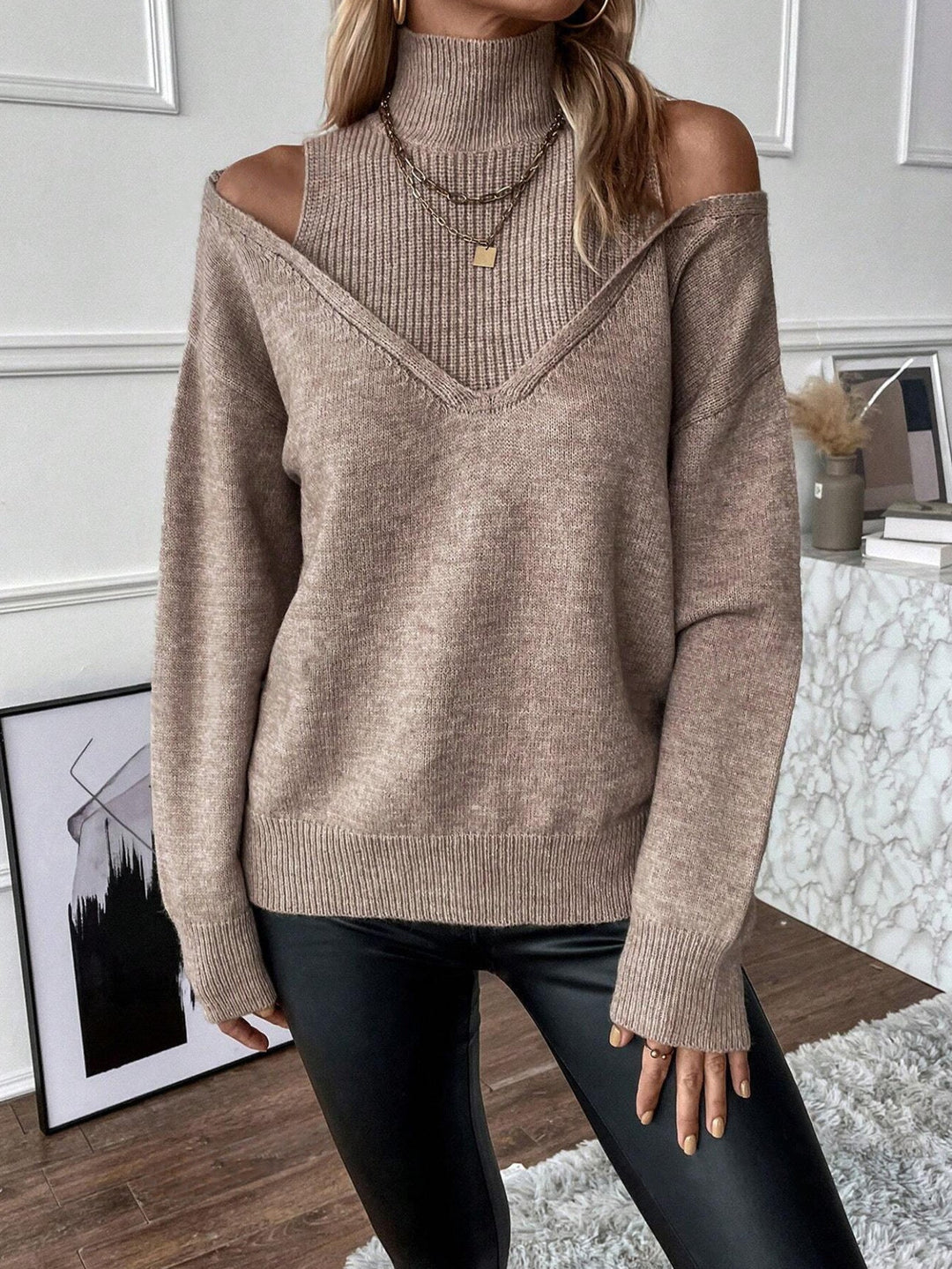Women's long sleeve cold shoulder turtleneck sweater, trendy and comfortable knitwear.