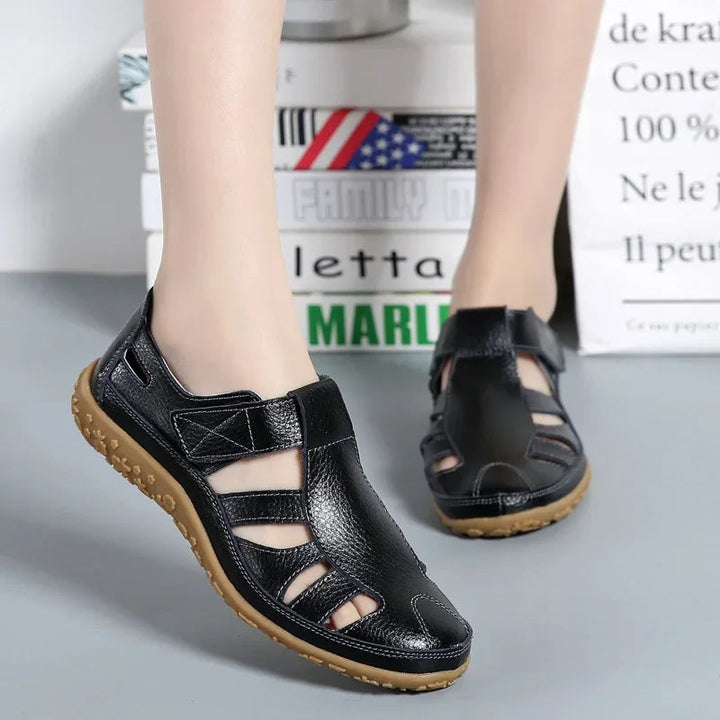 Open-toe women's comfort sandals with cushioned sole & adjustable Velcro, perfect for long summer walks.