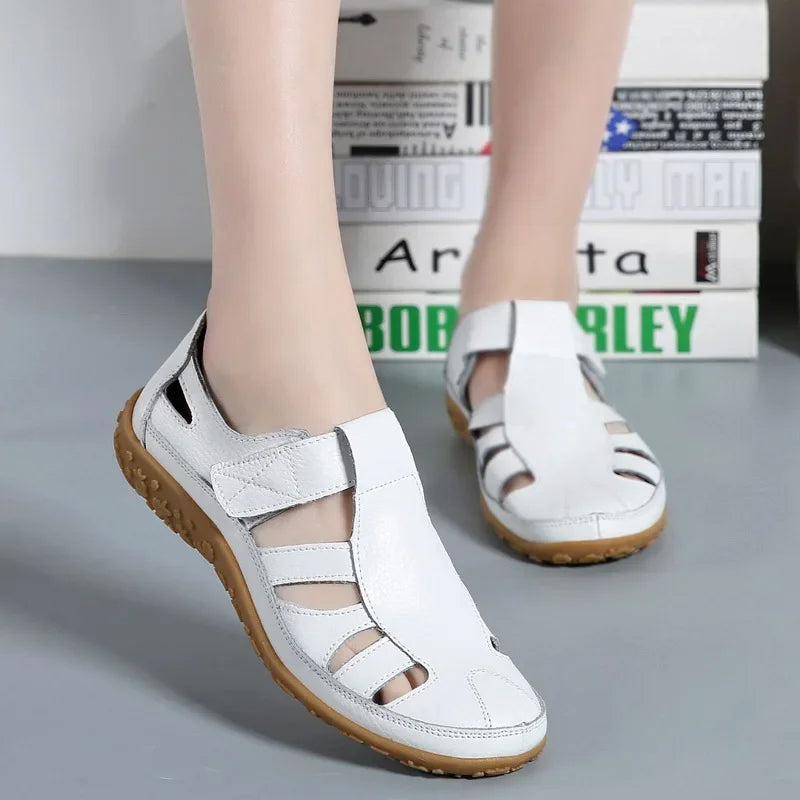 Genuine leather women's sandals with soft comfort sole & adjustable Velcro, great for casual summer outings.