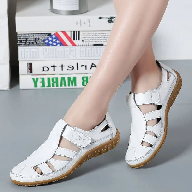 Side view: Women's adjustable Velcro leather comfort sandals, showing ergonomic design for summer walking.