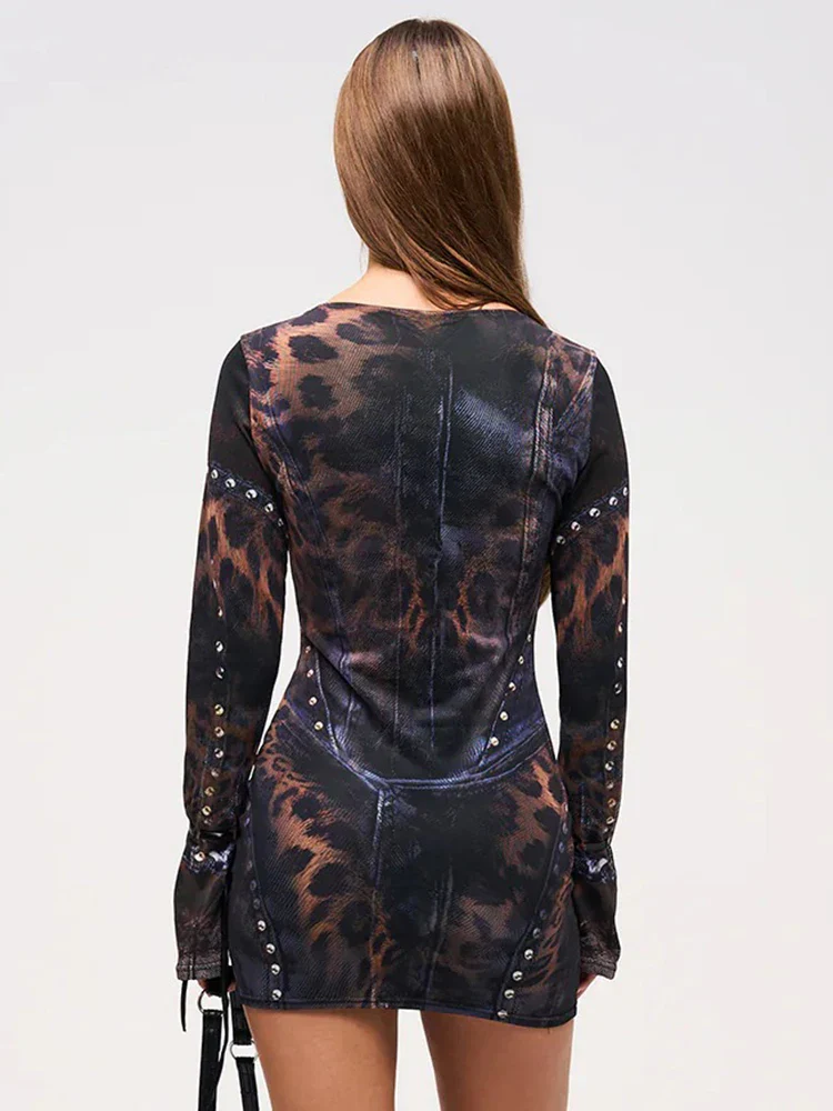 Edgy women's gothic mini dress featuring a striking leopard gradient print and long sleeves for parties.