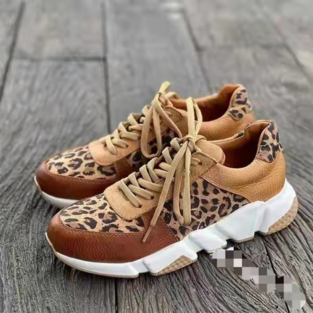 Close-up of women's leopard print lace-up sneakers, perfect casual everyday footwear