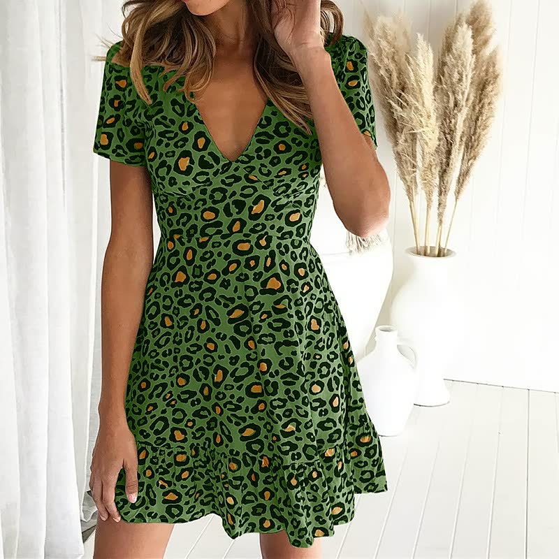 Stylish women's leopard print short sleeve V-neck mini dress, ideal for summer casual outings & parties.