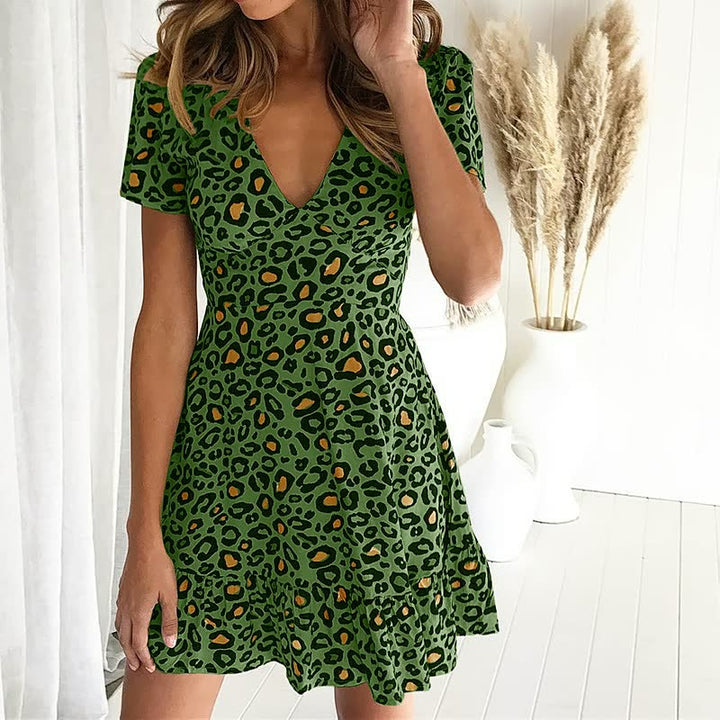 Stylish women's leopard print short sleeve V-neck mini dress, ideal for summer casual outings & parties.