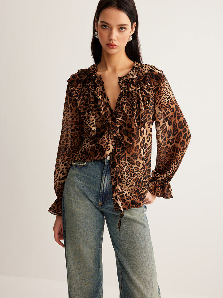 Stylish women's animal print blouse with a fashionable ruffle neck design