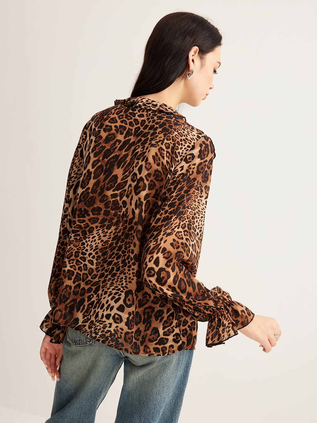 Women's summer top, leopard print, with a playful and stylish ruffled neckline