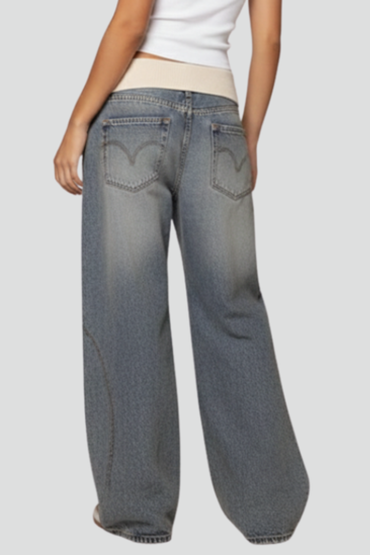 Casual women's light blue denim trousers with a baggy wide-leg fit, ideal for summer.