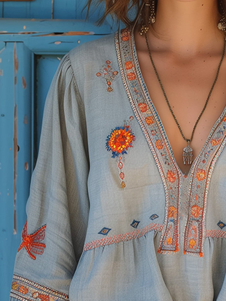 Casual light blue embroidered V-neck top for women, perfect for summer boho style