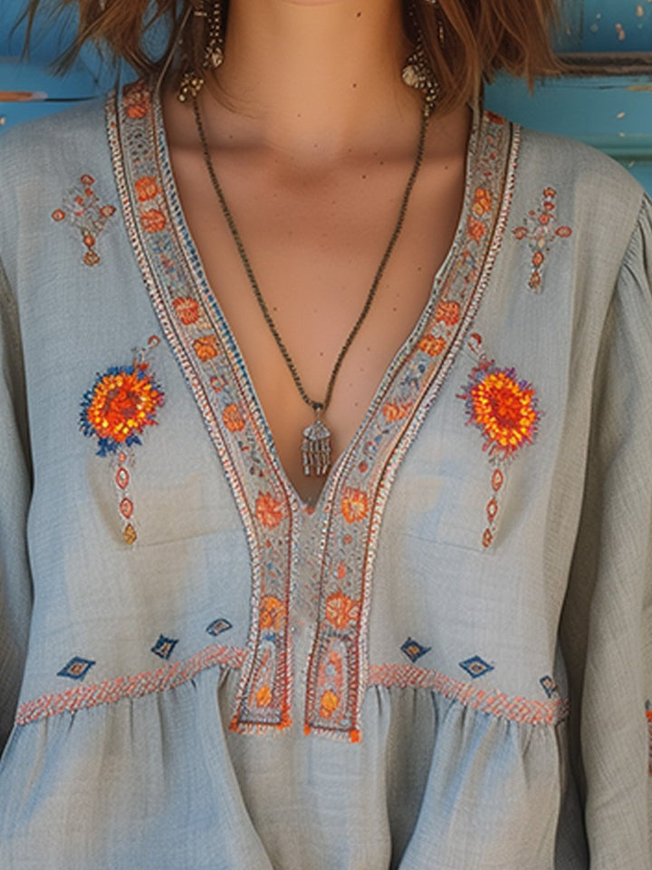 Bohemian summer blouse for women, light blue with intricate embroidery, ideal for vacation