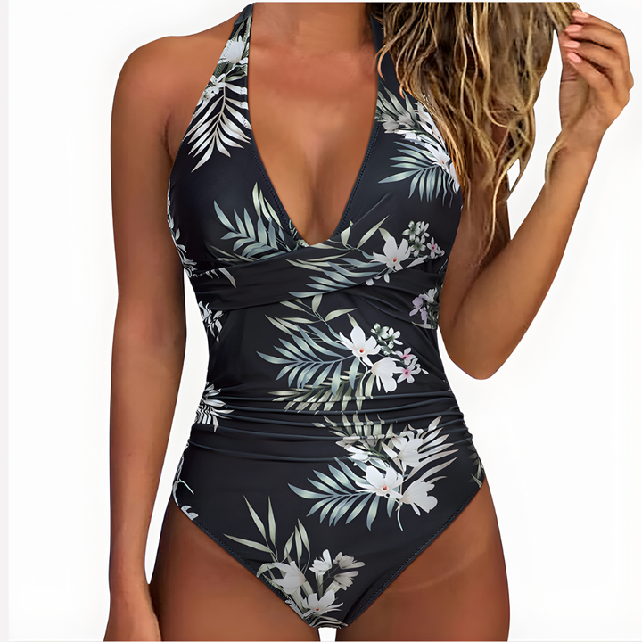 Detail of the waistline on women's light control pleated swimsuit, enhancing shape