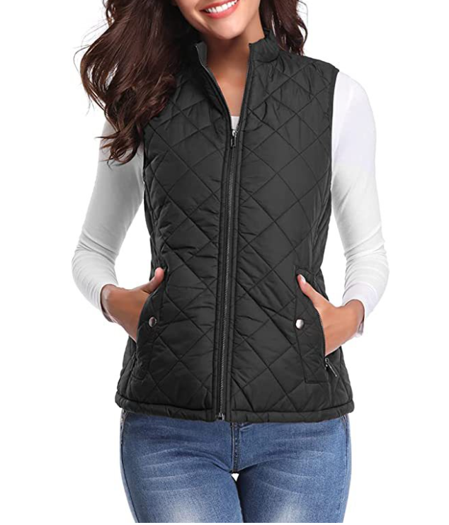 Woman wearing a stylish, lightly padded vest, perfect for cozy autumn/spring casual outfits.