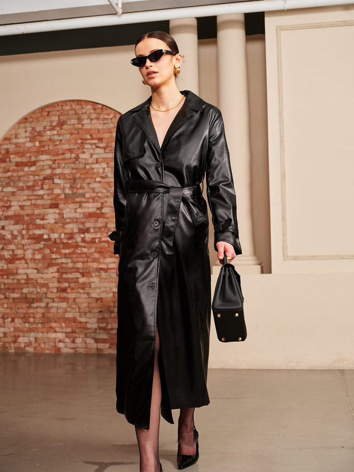 Elegant women's lightweight summer jacket, belted for a chic modern look, versatile outerwear.