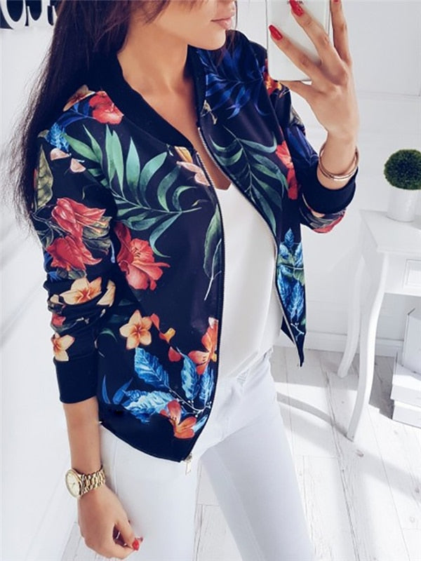 Vibrant floral bomber jacket for women, lightweight & comfortable. Perfect casual zip-front summer layer.