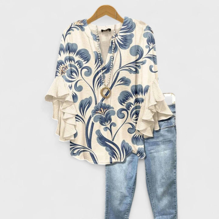 Women's lightweight floral v-neck blouse with ruffled sleeves, perfect for spring casual wear.