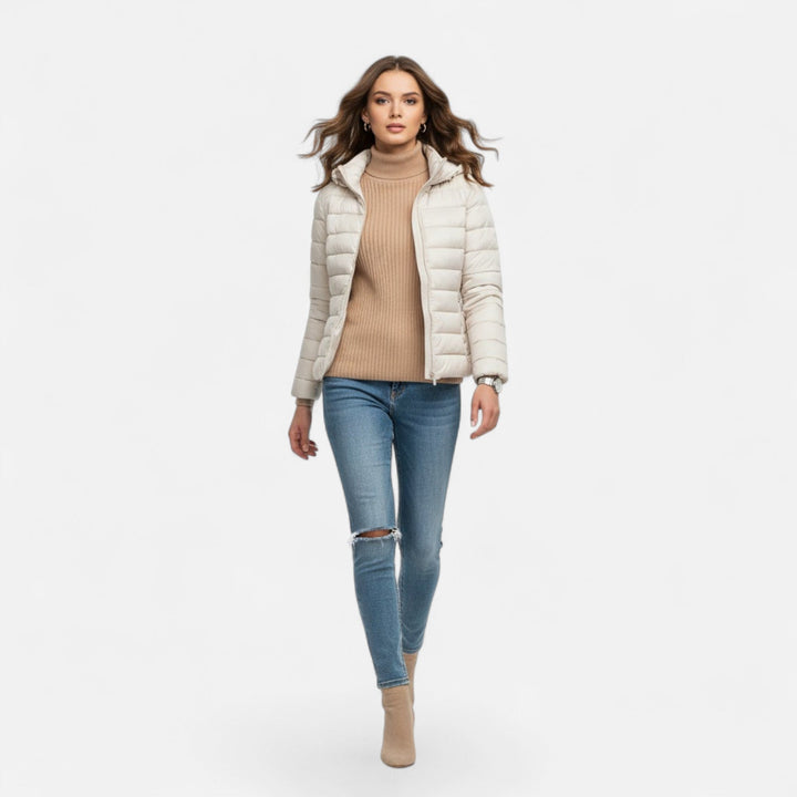 Women's autumn/winter insulated coat, lightweight & warm, designed for comfortable cold weather.