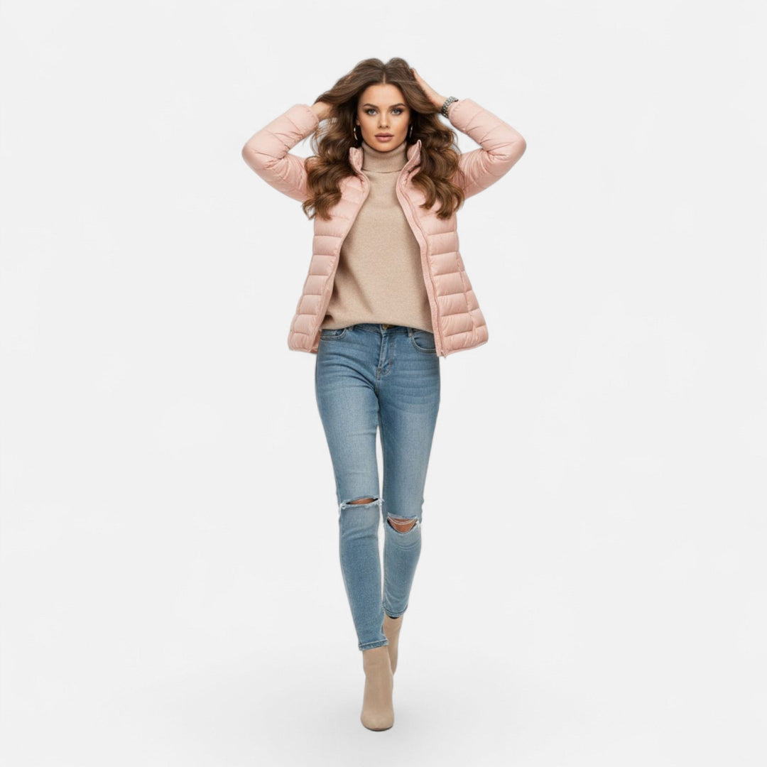 Elegant women's hooded outerwear, insulated & lightweight, ideal for cold weather style.