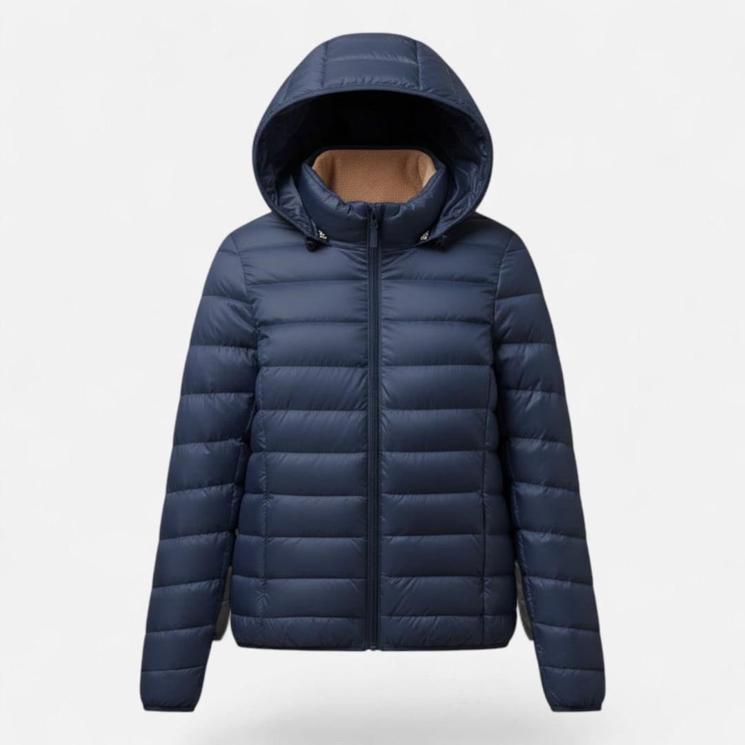 Lightweight women's winter coat, insulated for warmth, featuring a stylish slim fit design.