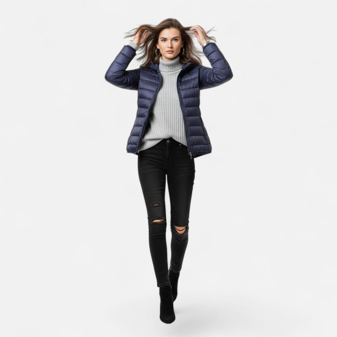 Stylish women's cold weather coat, lightweight, insulated, and hooded for ultimate warmth.
