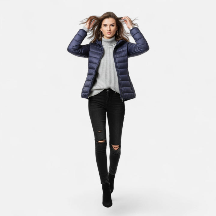 Stylish women's cold weather coat, lightweight, insulated, and hooded for ultimate warmth.