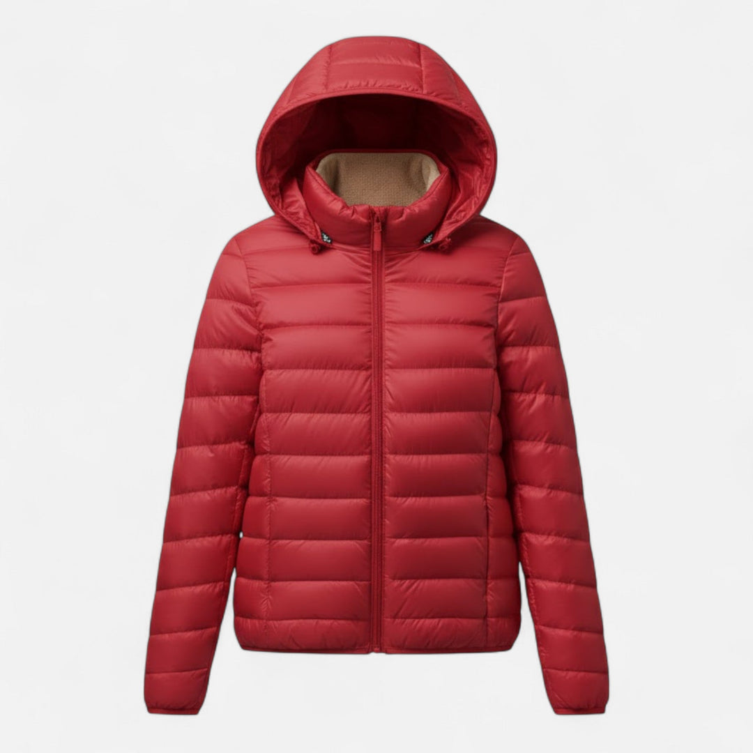 Slim-fit women's winter fashion coat, insulated & lightweight for elegant cold weather wear.