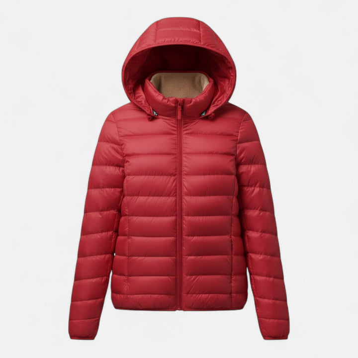 Slim-fit women's winter fashion coat, insulated & lightweight for elegant cold weather wear.