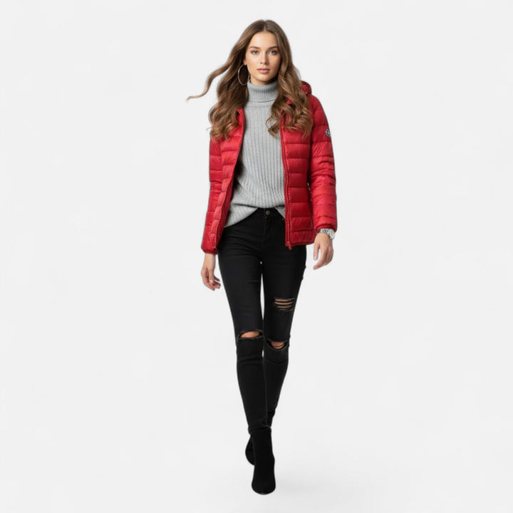 Women's hooded insulated jacket, lightweight for winter, offering warmth & style.
