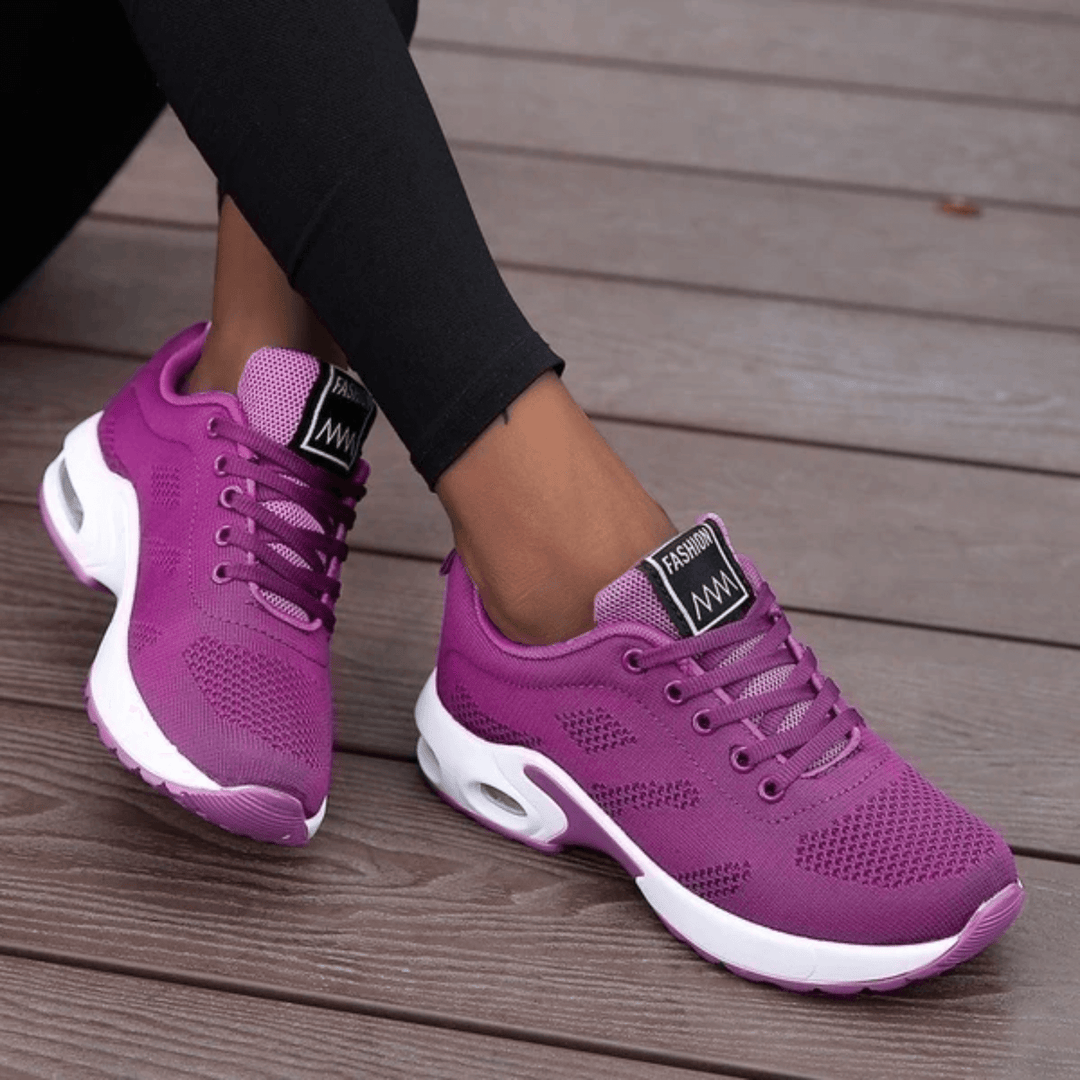 Versatile women's athletic sneakers, perfect for running & walking. Lightweight orthopedic design ensures comfort.