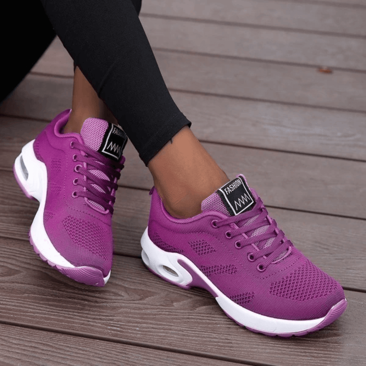 Versatile women's athletic sneakers, perfect for running & walking. Lightweight orthopedic design ensures comfort.
