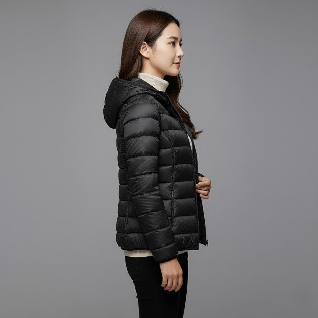 Lightweight women's padded jacket, excellent for layering and outdoor winter activities