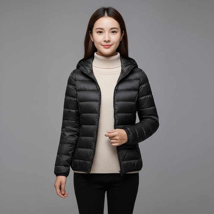 Women's hooded puffer jacket, designed for comfort and modern winter style
