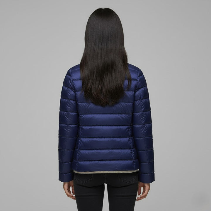 Winter outerwear: women's insulated jacket with stand collar, ideal for cold weather