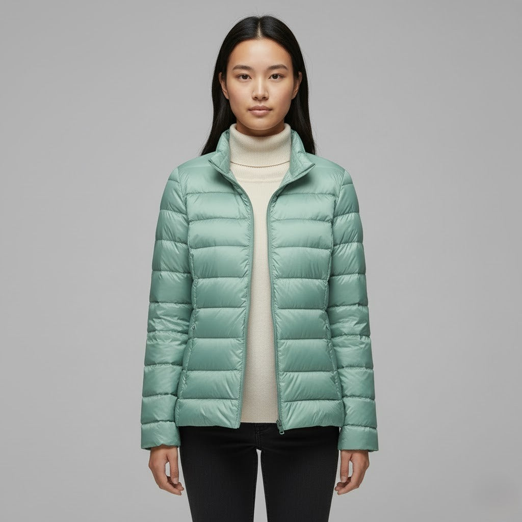 Women's winter coat, a black insulated puffer jacket with a sleek design