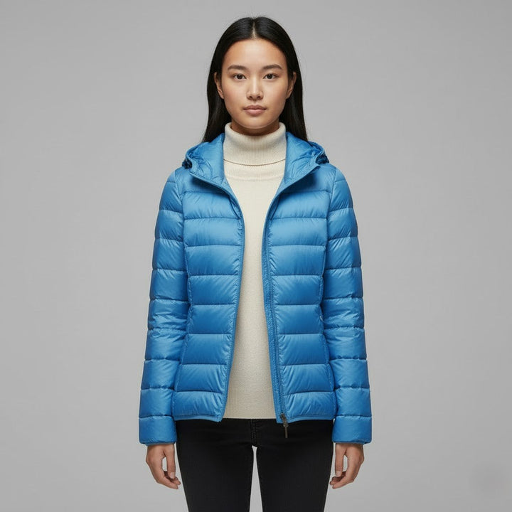 Hooded puffer jacket for women in vibrant color, brightening up winter outerwear