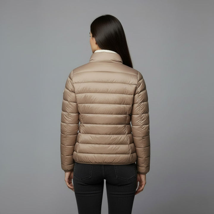 Stylish women's winter outerwear, featuring a stand collar puffer jacket design