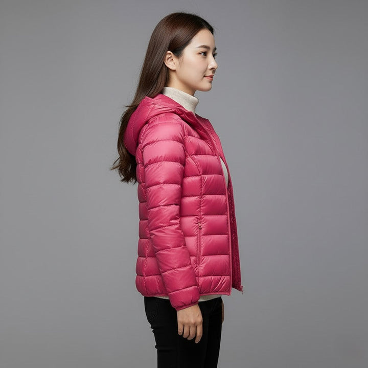 Casual women's outerwear: a stylish hooded puffer jacket in a subtle print