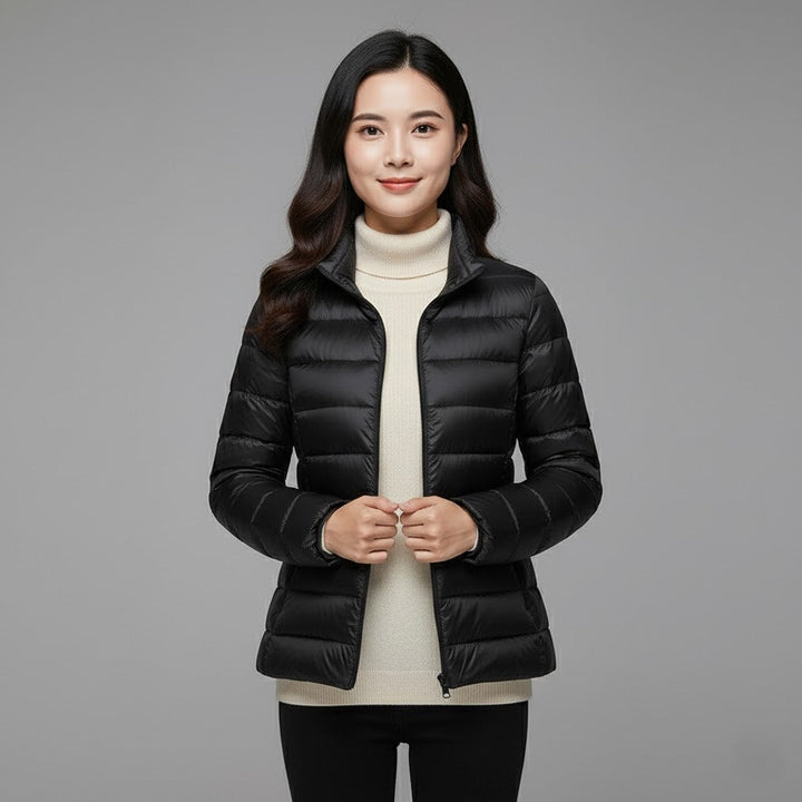 Stylish black women's winter coat, a lightweight insulated puffer jacket
