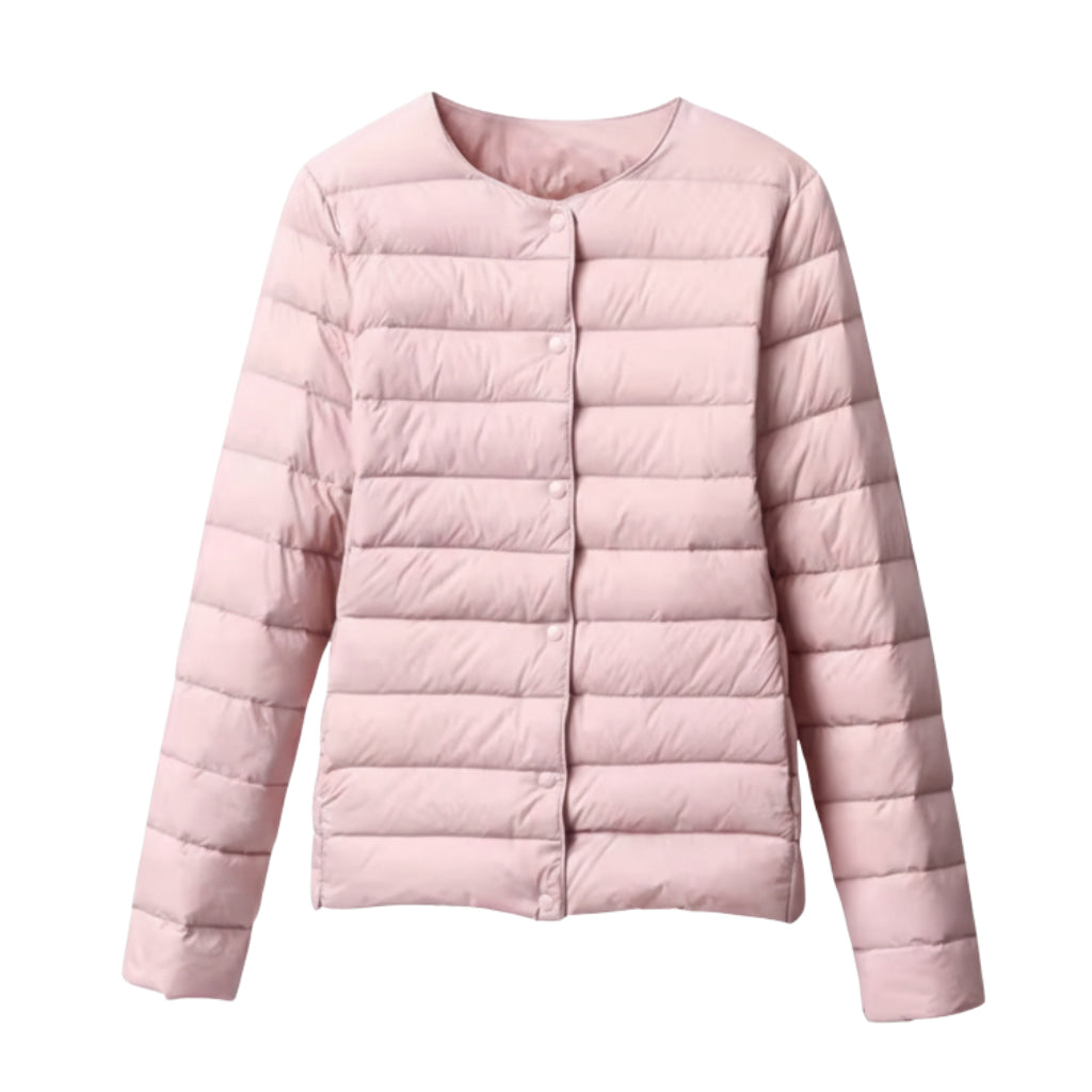 Close-up of a women's quilted puffer jacket in a vibrant spring color, lightweight outerwear