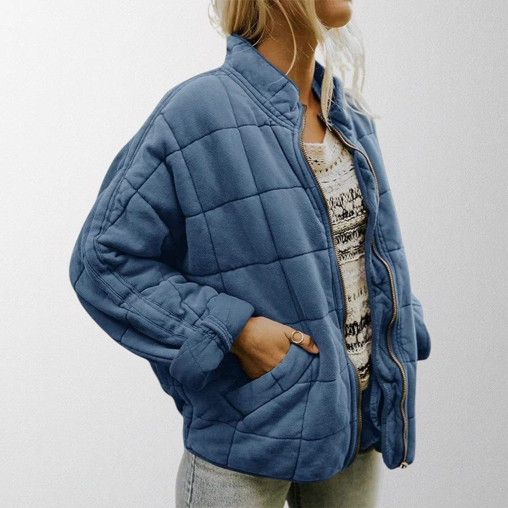Close-up of women's quilted jacket texture, Zelda #1722, ideal for spring/fall.