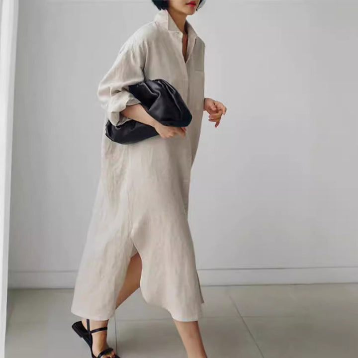 Comfortable women's summer shirt dress with elegant side slits & button-down design, ideal for everyday style.