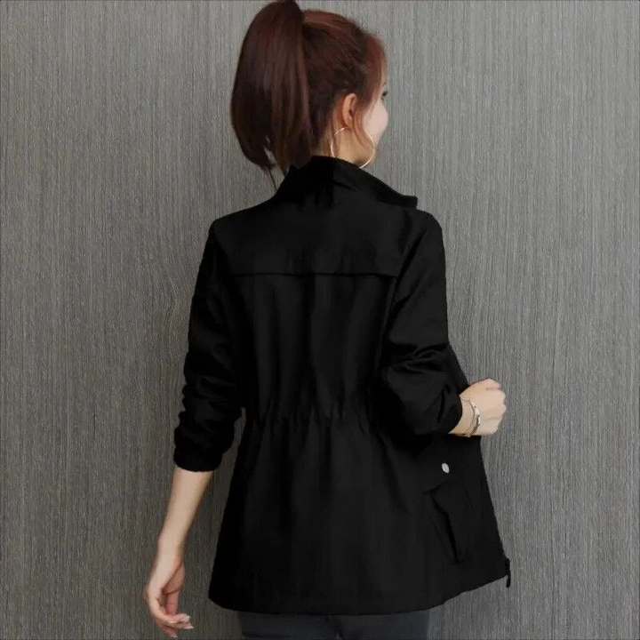Versatile women's short transitional jacket for spring and autumn. Lightweight outerwear for stylish and comfortable wear.