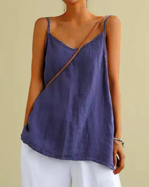 Casual women's spaghetti strap tank top, designed for comfortable and chic warm weather style.