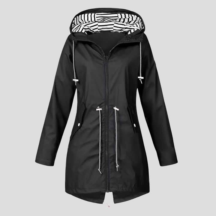 Stylish women's lightweight hooded raincoat in a vibrant red, perfect for activewear and travel.