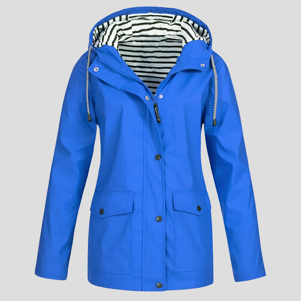 Folded women's rain jacket, highlighting its packable and lightweight design for travel.