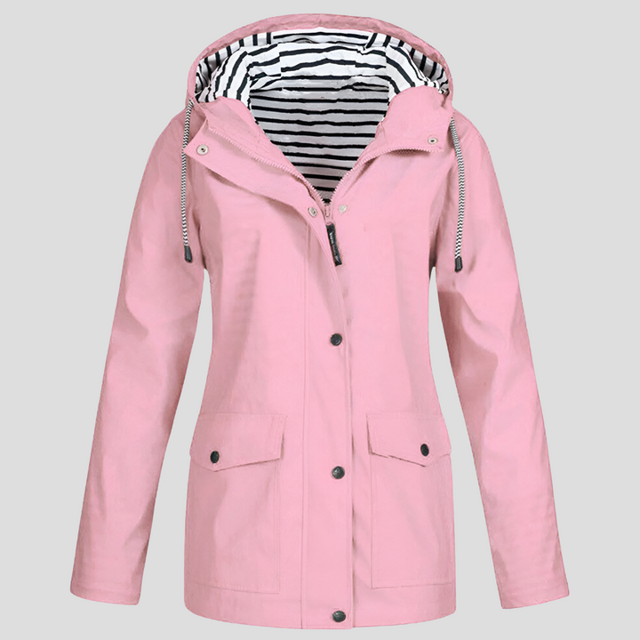 Detail of the zipper and adjustable hood on a durable women's outdoor wear jacket.