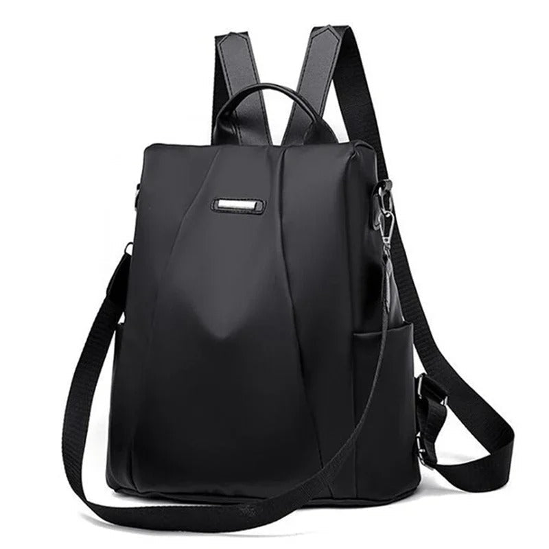 Women's lightweight water-resistant nylon backpack. Multi-way carry for versatile everyday & travel use.